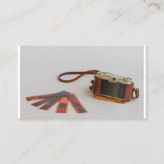 gammal kamera med negation på   visitkort