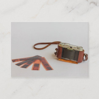gammal kamera med negativt affärskort visitkort