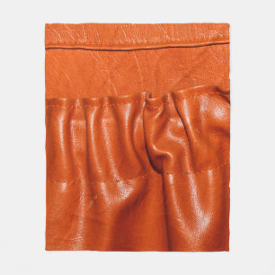 Gammal lädersätesdetalj i vintage bil. fleecefilt