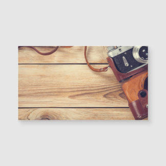 Gammal Retro kamera på träbordbakgrund