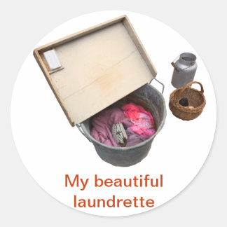 gammal tvättknapp runt klistermärke