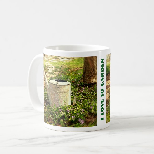 Gammaldags vattenkanna i en fläck av vinca kaffemugg (Framsida vänster)
