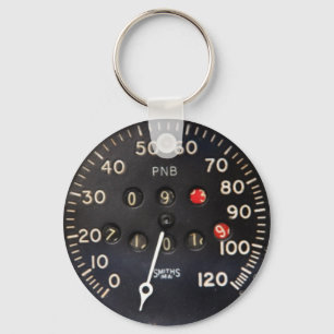 Gammalt speedometermätinstrument från en nyckelring
