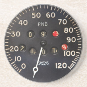 Gammalt speedometermätinstrument från en underlägg sandsten