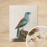 Garrulous Roller | William Lewin Pussel<br><div class="desc">Garrulous Roller (före 1790) | William Lewin’s Garrulous Roller är en sjudande och noggrant utförlig målning som visar en träffande brun och turkotisk rulla som genomborras på en logg mot en minimalistisk bakgrund av neutralten. Konstnären fångar på ett mästerligt sätt fågelns livliga vrede och vidlyftiga hållning och betonar dess naturliga...</div>
