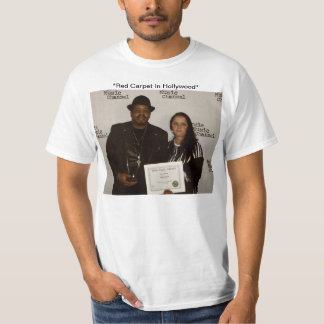 "Garry & Carmen Moore på rött matta ", Tee