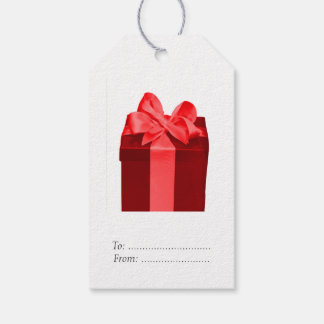 Gåvan boxas med satängpilbågen presentetikett