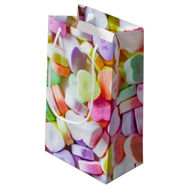 Gåvan hänger lös - godiskonversationhjärtor (Baksidan Vinklad)