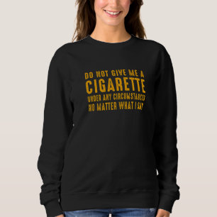 Ge mig inte en cigarett under några som helst omst t shirt