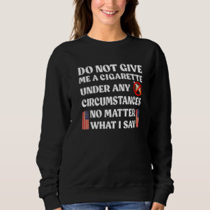 Ge mig inte en cigarett under några som helst omst t shirt