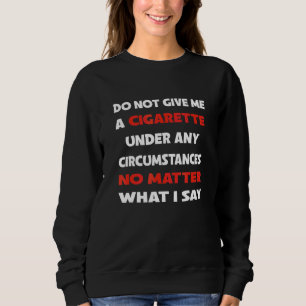 Ge mig inte en cigarett under några som helst omst t shirt