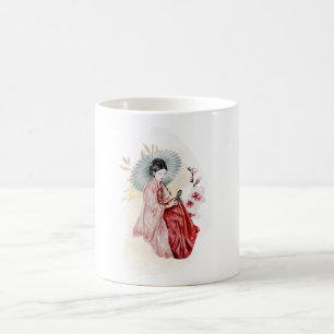 Geisha sitter nära en gyllene bamboo kaffemugg