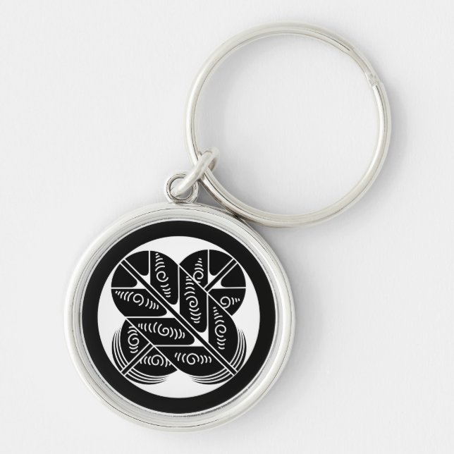 Geishu hökfjädrar rund silverfärgad nyckelring (Framsidan)