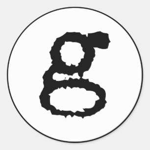 gemener brev g i svart runt klistermärke