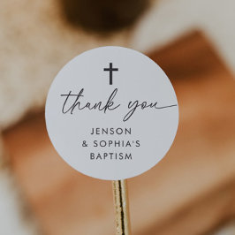 Gemensam baptism runt klistermärke