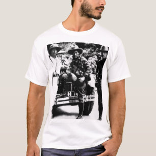 Generator Sandino (centrera), och bemannar _War Tee Shirt