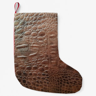 Genuine leather texture backgroundr close-up, embo liten julstrumpa