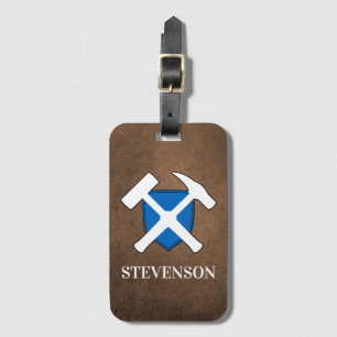 Geologisternas Logotyp Sten Hammer och Scottish Fl Bagagebricka