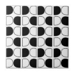 Geometric Black and White Half Circle Kakelplatta<br><div class="desc">Geometric Black and White Half Circle ceramic tile original design by Nisha Prabhu. Enhance your home decor with our Geometric Black and White Half Circle Ceramic Tile! Perfect for adding a touch of modern elegance to any space, this stunning tile features a unique half-circle geometric pattern that can complement a...</div>