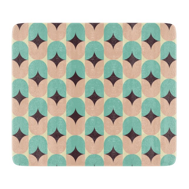 Geometric pattern of teal, beige, and black shapes (Framsidan)