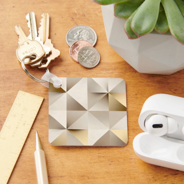 Geometric relief texture in beige and gold nyckelring (Skrivbord)