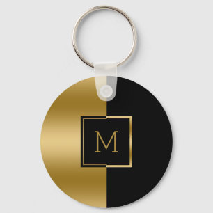 Geometrisk design i svart och Guld Nyckelring