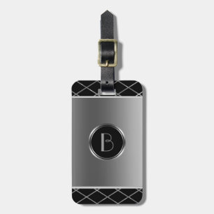 Geometrisk design i svart och metallisk Silver Bagagebricka