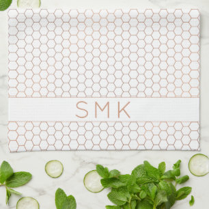 Geometrisk hexagonmonogram av kopparguld Ro Kökshandduk