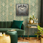 Geometrisk perfektion i Art Deco-stil Fyrkantig Klocka<br><div class="desc">Geometrisk perfektion,  gyllene elegans och ren vintage charm. Perfekt för designälskare med klassisk smak.</div>