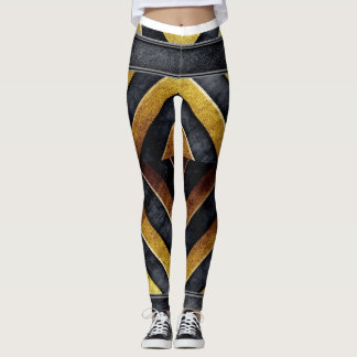 geometrisk svart och guld mönster leggings