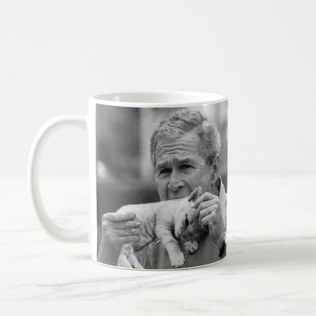 George W Bush som äter en kattunge Kaffemugg (Vänster)