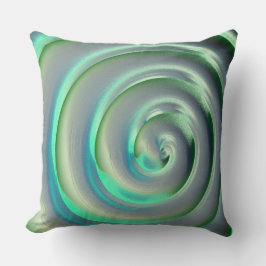 Giant silver och aquamarine spiral över grönten kudde