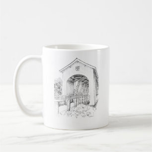 Gilkey överbryggar med (den högerhänta) legende kaffemugg