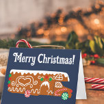 Gingerbread husvagn Klass C husbil Anpassad Helgkort<br><div class="desc">Både meddelandet på framsidan och meddelandet på insidan av detta kort kan anpassas med din egen text. Detta julkort har en illustration av en pepparkakor husvagn. Denna festliga kakor husbil är dekorerad med vit glasyr och gröna och röda godisar. Grafiken är satt mot en marinblå bakgrund.</div>