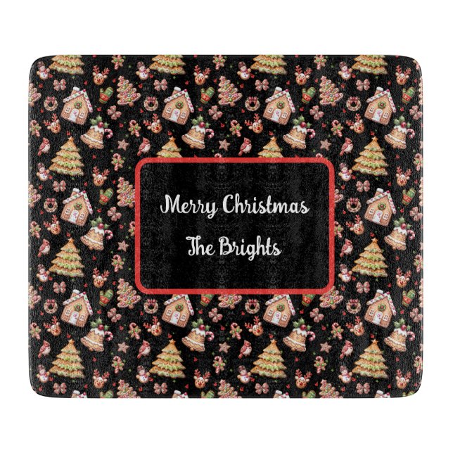 Gingerbröd julkakor på svart bakgrund (Framsidan)