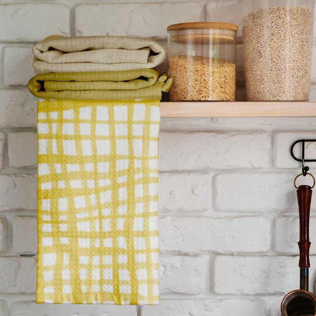 Gingham mönster i gult kökshandduk (Skapare uppladdad)