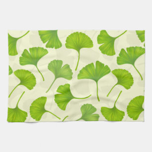 Ginkgo mönster på benvit kökshandduk