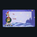 Giraffe juletikett fraktsedel<br><div class="desc">Djurens Parad Giraffe håller på att bli festlig i en röd tomtehatt och en helgdag hollisk andedräkt på en texturerad fält av blått med gult stjärnor. Märkre alla presenter i år med en roligt och ett fånig som är utcheckat av etiketten giraffe to / Från. Många av våra produkter har...</div>