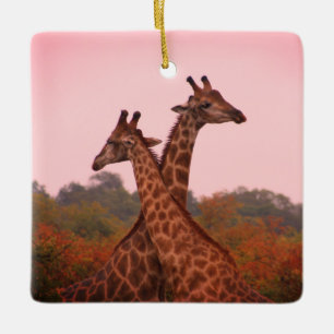 Giraffes med rosa himmel julgransprydnad keramik