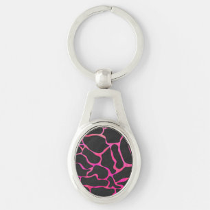 Giraffshock rosa och svart tryck ovalt silverfärgad nyckelring