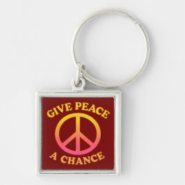'Give Peace a Chance' Keychain Fyrkantig Silverfärgad Nyckelring