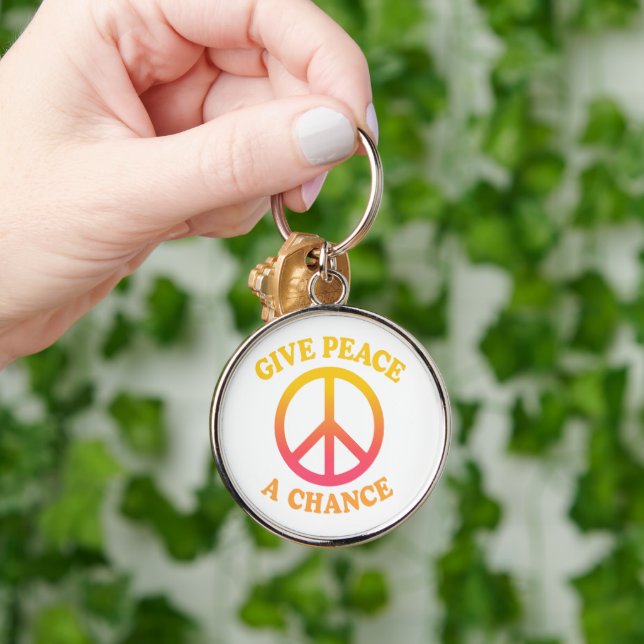 'Give Peace a Chance' Keychain Rund Silverfärgad Nyckelring (Hand)