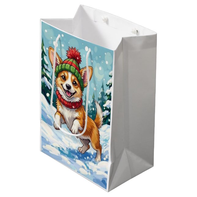 Glad Corgi-hund som studsar i snö med pom-pom (Framsidan Vinklad)