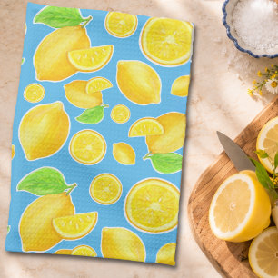 Glad gul citron och blå citrusmönster kökshandduk