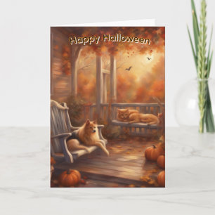 Glad Halloween katt och hund på en främre veranda Kort