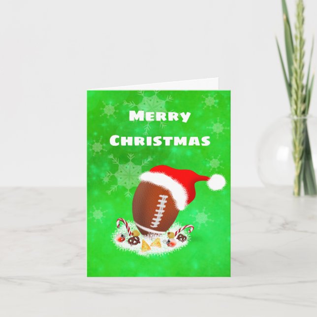 Glad jul fotboll med tomtehatt och snacks helgkort (Framsida)