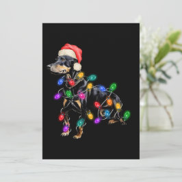 Glad jul hund intrasslad i ljus julkort