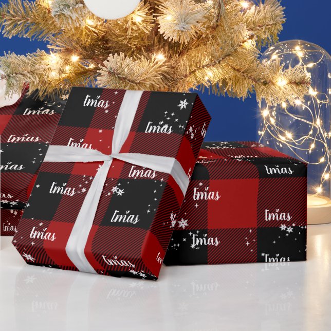 Glad jul text i snöflingor på karott  presentpapper (Helgdagar)