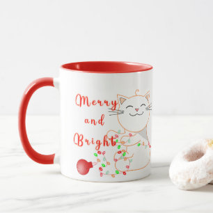 Glad katt leker med LED-ljus Söt jul Mugg