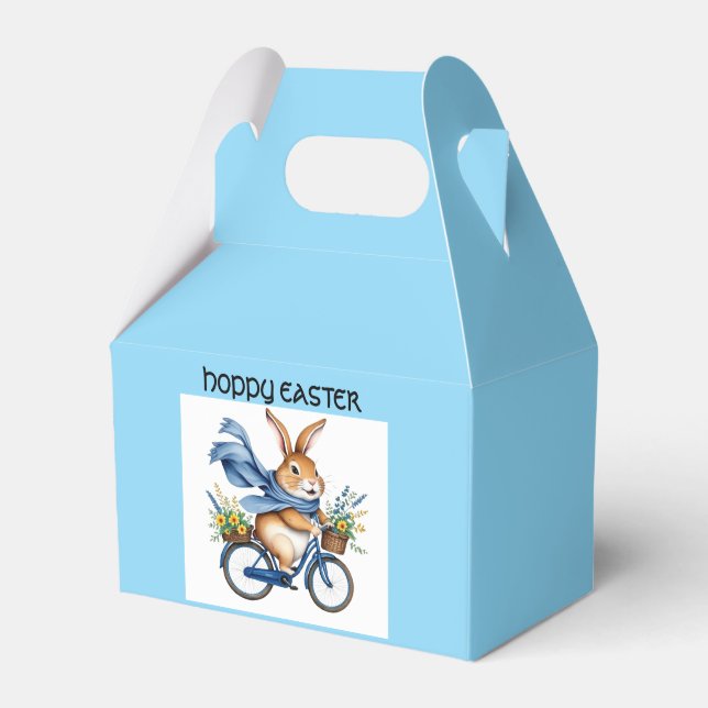 glad påskharen på cykel blå presentaskar (Framsidan Sidan)